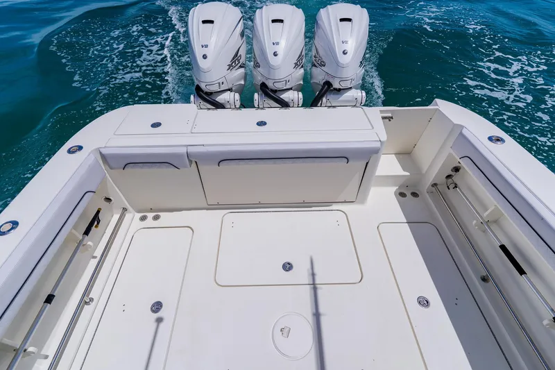 Slide: The Image of 2008 Hydra-Sports Vector 3500 VX boat deck with twin V8 engines on open water. - 41