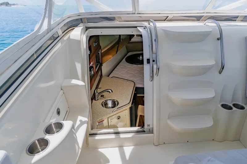Slide: The Image of 2008 Hydra-Sports Vector 3500 VX cabin interior with kitchenette and seating area. - 49