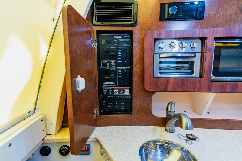 Slide: The Image of 2008 Hydra-Sports Vector 3500 VX interior with control panel, oven, and sink. - 52