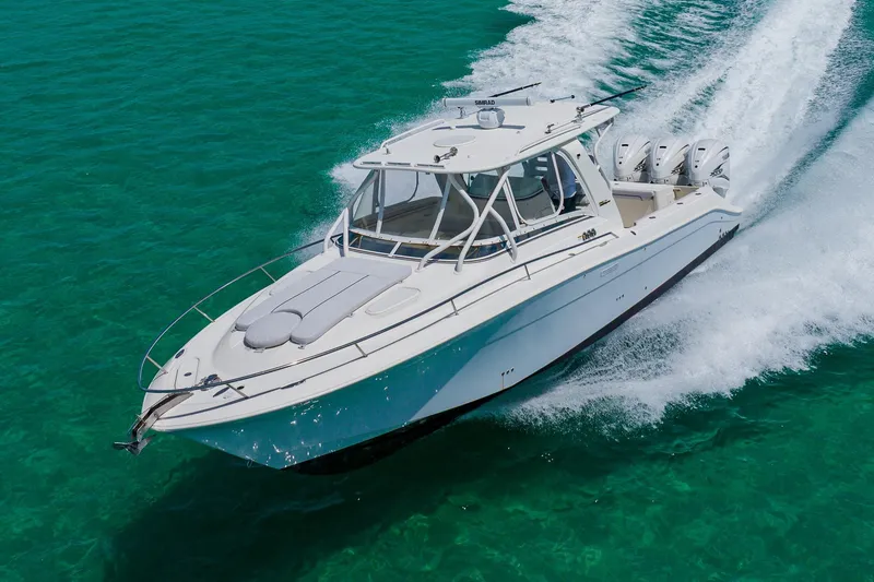 Slide: The Image of 2008 Hydra-Sports Vector 3500 VX cruising on clear turquoise water. - 6