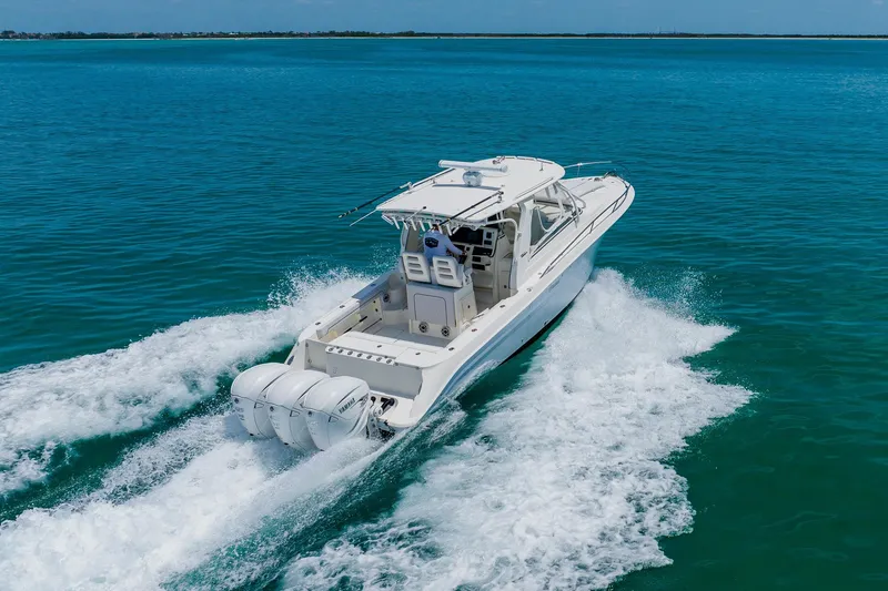 Slide: The Image of 2008 Hydra-Sports Vector 3500 VX cruising on clear blue ocean waters. - 8