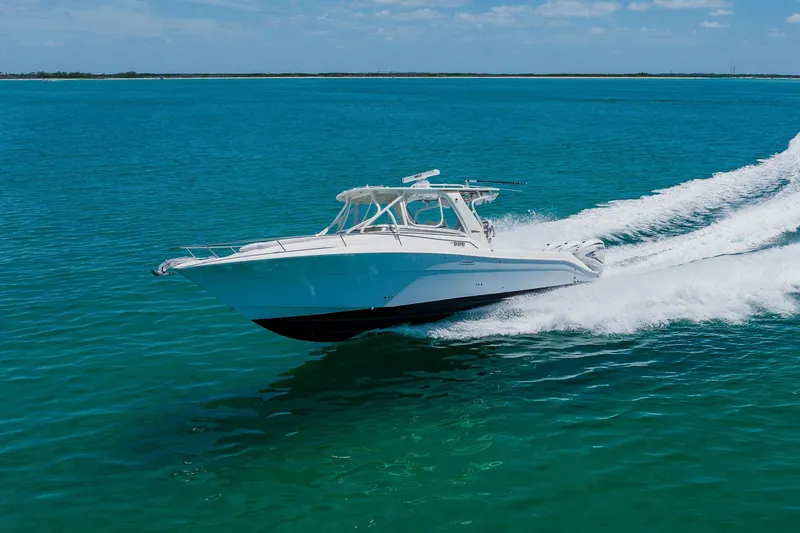Slide: The Image of 2008 Hydra-Sports Vector 3500 VX cruising on clear blue ocean waters. - 9