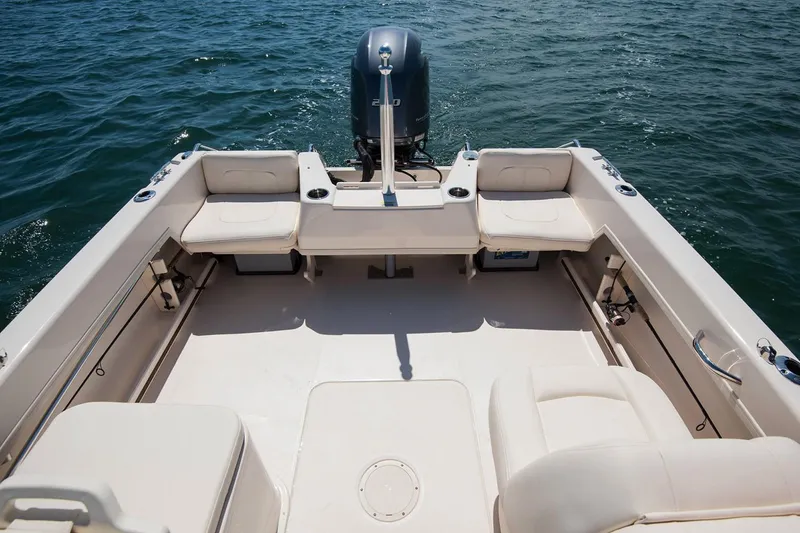 Slide: The Image of Manufacturer Provided Image: 2020 Grady-White Freedom 192 boat interior with seating and outboard motor. - 10