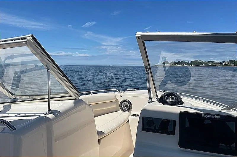Slide: The Image of 2020 Grady-White Freedom 192 boat interior with ocean view and clear skies. - 13