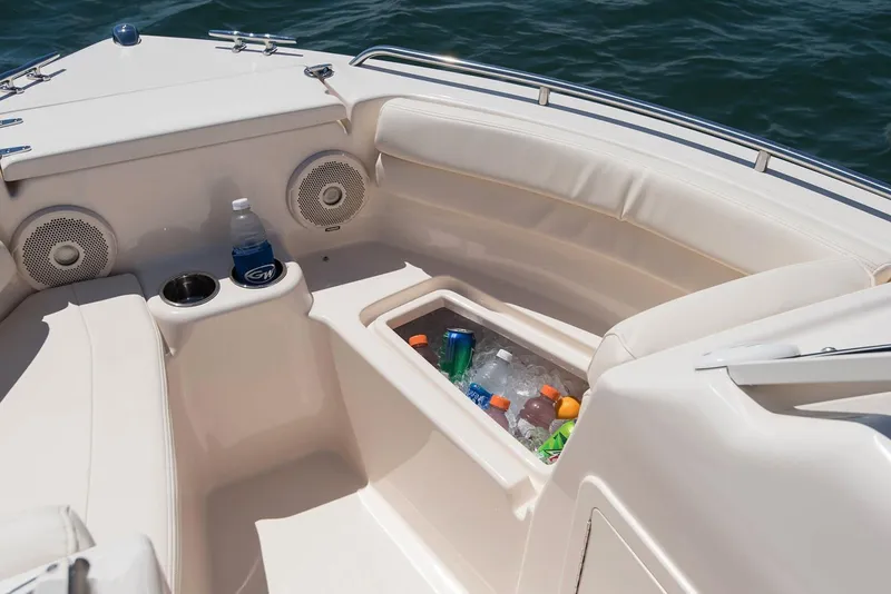 Slide: The Image of Manufacturer Provided Image: Grady-White Freedom 192 boat interior with beverage cooler, speakers, and cup holders. - 5
