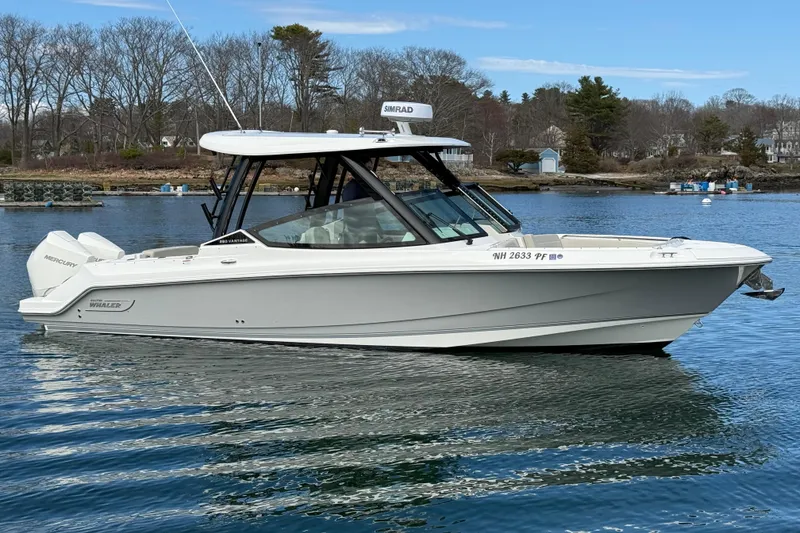 The Image of 2023 Boston Whaler 280 Vantage boat on calm water, showcasing sleek design and modern features. - 0