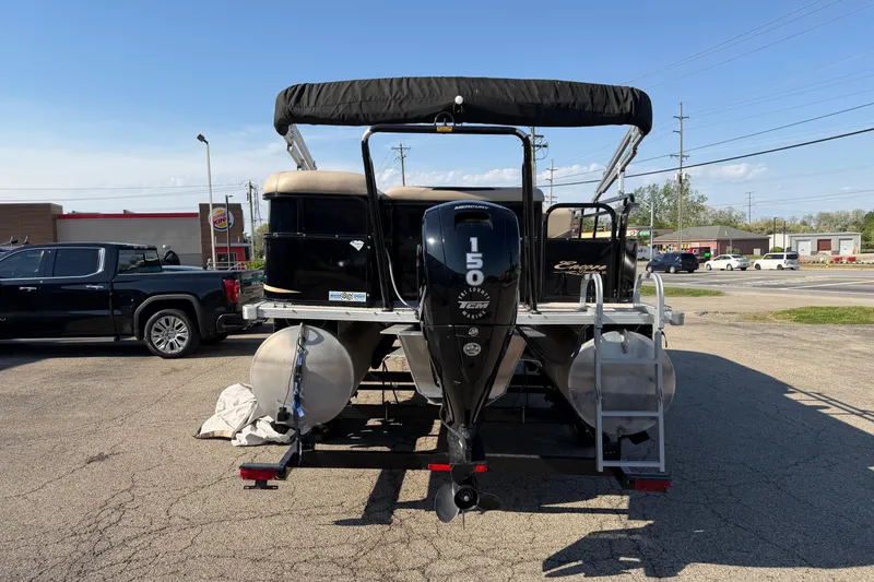 Slide: The Image of 2012 Bentley Pontoons 240 CRUISE with Mercury 150 engine on trailer. - 13