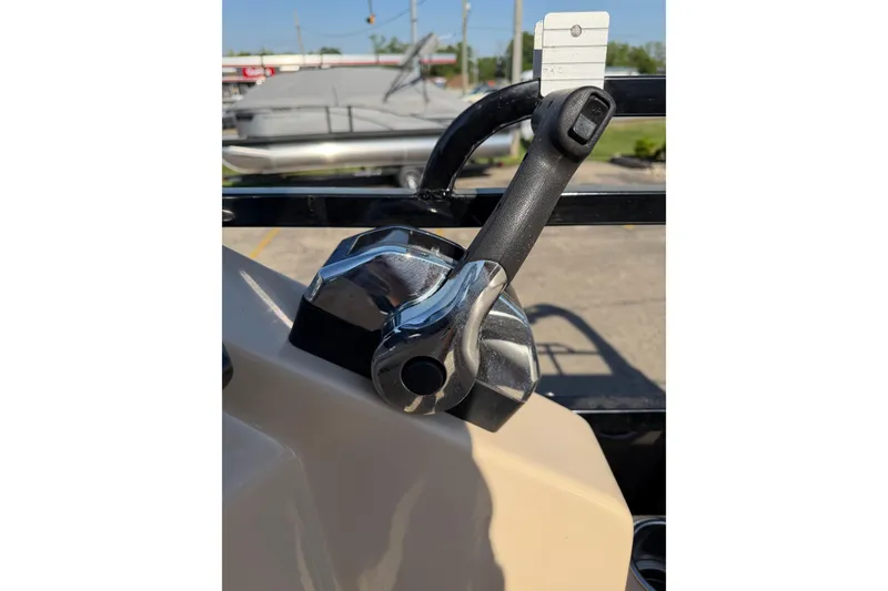 Slide: The Image of Close-up of a 2012 Bentley Pontoons 240 CRUISE throttle control lever. - 7