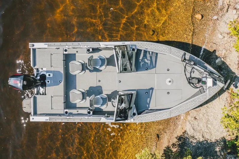 Slide: The Image of Overhead view of 2026 KingFisher 2125 Arrow Sport boat on clear water. - 3