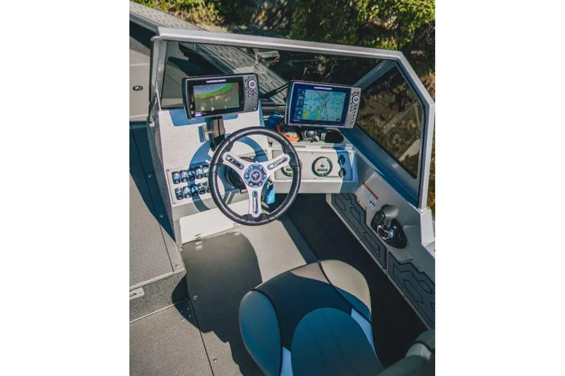 Slide: The Image of Interior of 2026 KingFisher 2125 Arrow Sport boat with advanced navigation systems. - 6