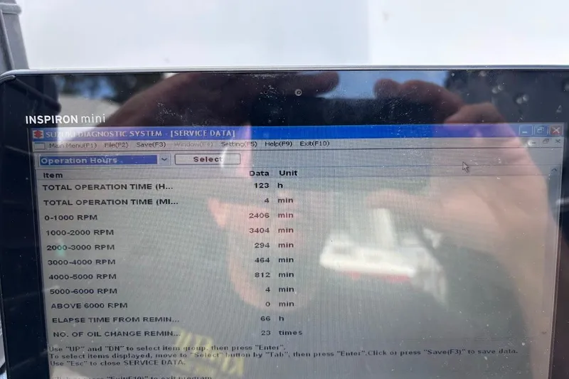 Slide: The Image of Laptop displaying Suzuki diagnostic system data for Boston Whaler 290 Outrage, 2002 model. - 51