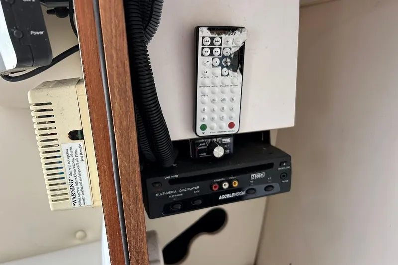 Slide: The Image of Electronics setup inside a 2002 Boston Whaler 290 Outrage boat. - 62