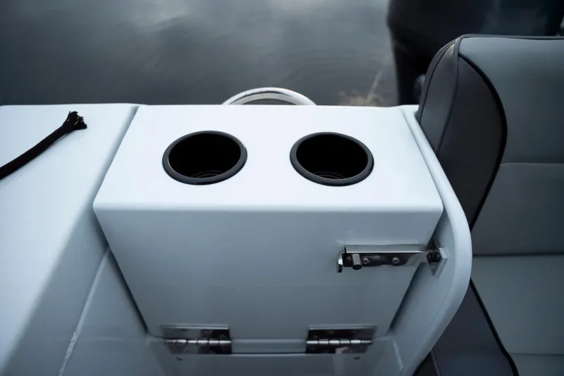 Slide: The Image of Cup holders on a 2026 KingFisher 23 XAC boat, featuring sleek design and functionality. - 15