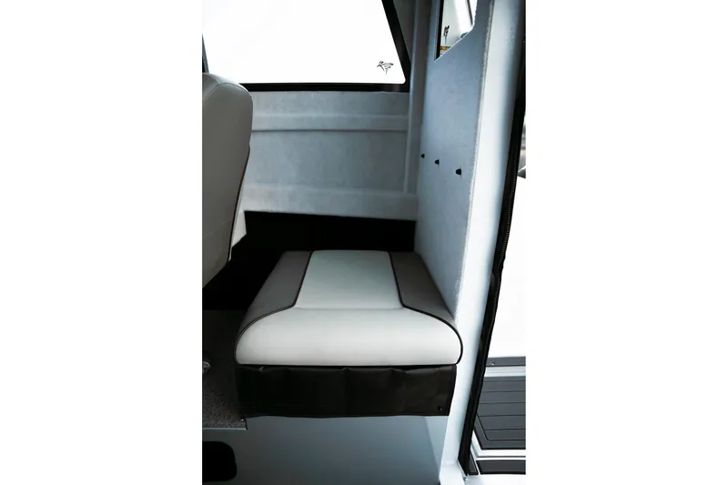 Slide: The Image of Interior seating of 2026 KingFisher 23 XAC boat, featuring sleek, modern design. - 7