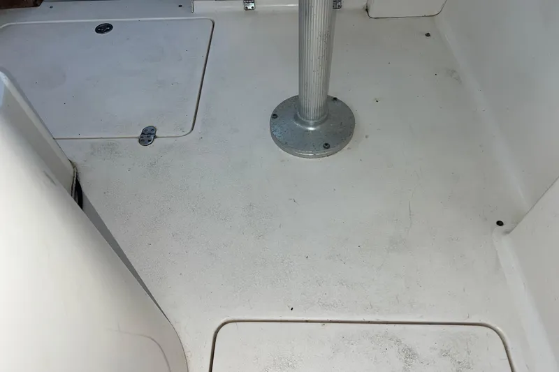 Slide: The Image of 2005 Shamrock 270 Mackinaw boat interior floor with metal pedestal. - 22