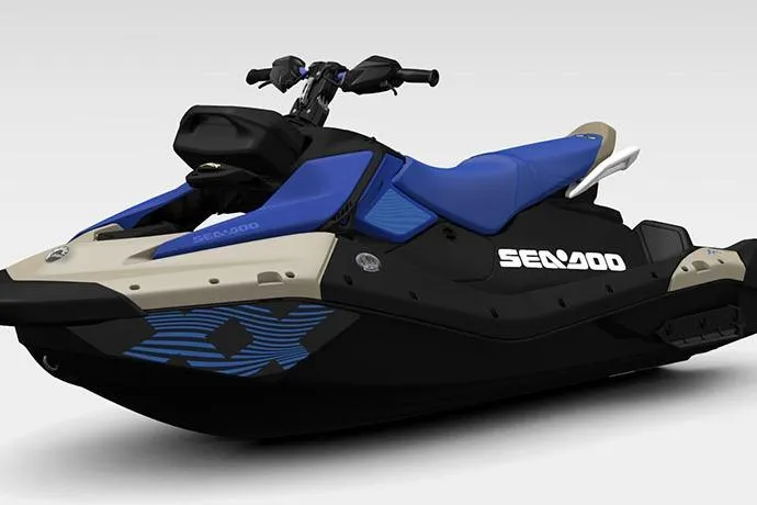 Slide: The Image of 2025 Sea-Doo Spark Trixx for 3, blue and black design, side view. - 7