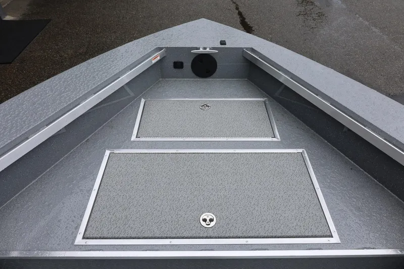 Slide: The Image of Bow view of 2026 Thunder Jet 229 Rush OT boat with storage compartments. - 10