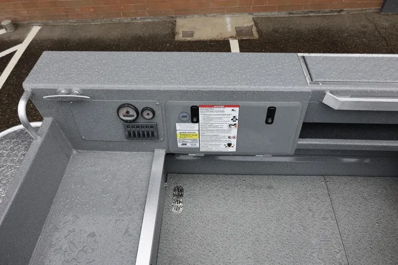 Slide: The Image of Control panel of 2026 Thunder Jet 229 Rush OT boat, featuring gauges and switches. - 18