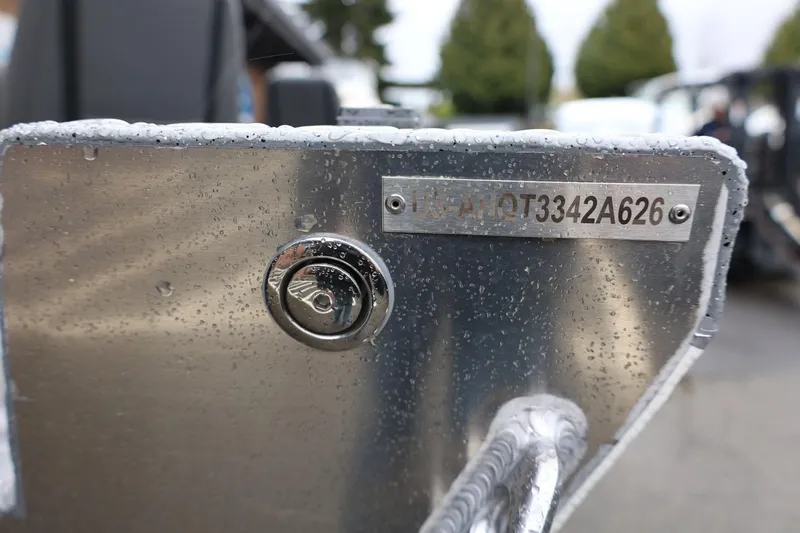 Slide: The Image of Close-up of 2026 Thunder Jet 229 Rush OT boat hull with identification number. - 23