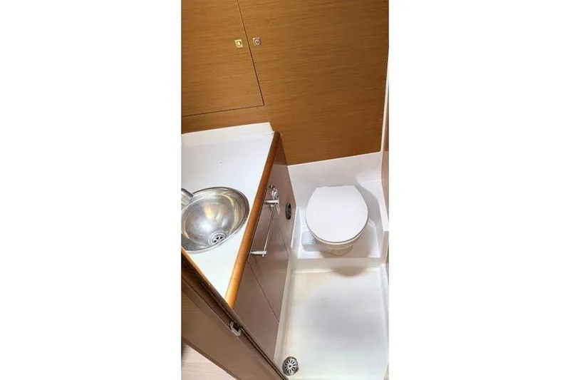 Slide: The Image of 2018 Jeanneau Sun Odyssey 419 bathroom with sink and toilet. - 14
