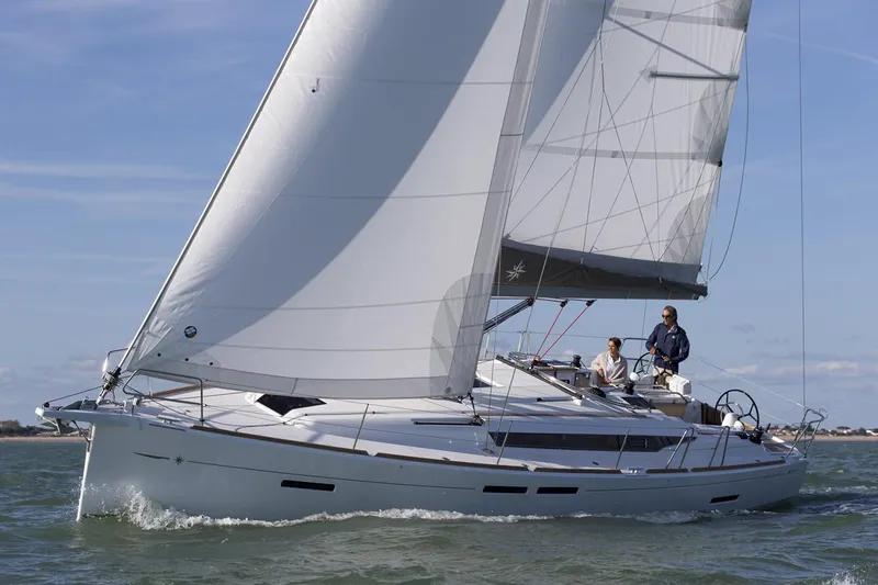 Slide: The Image of Manufacturer Provided Image: 2018 Jeanneau Sun Odyssey 419 sailing on open water. - 26