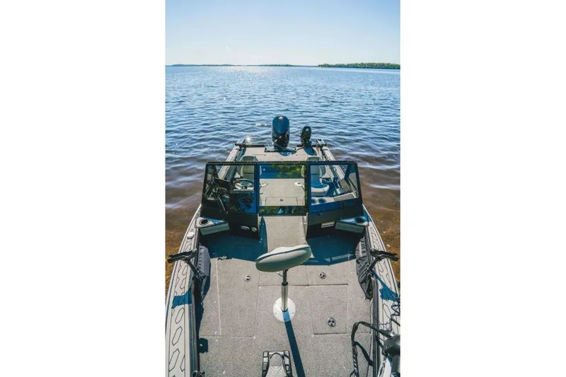 Slide: The Image of KingFisher 1925 Arrow Sport boat on calm lake, 2026 model. - 8