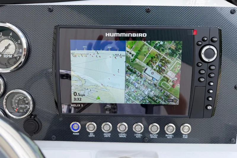 Slide: The Image of Humminbird Helix 9 GPS display on 2022 Xpress H20B Bay boat dashboard. - 14