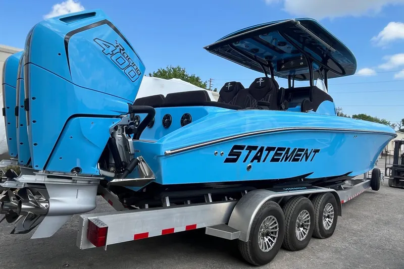 Slide: The Image of 2025 Statement 350 Open boat interior with compact bathroom, featuring toilet and sink. - 10