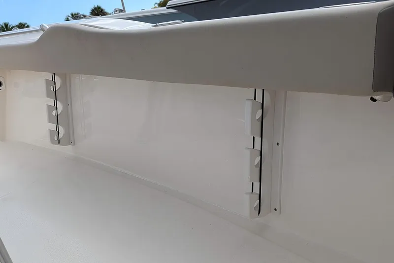 Slide: The Image of Interior view of a 2021 Key West 219 FS boat, showcasing rod holders. - 11