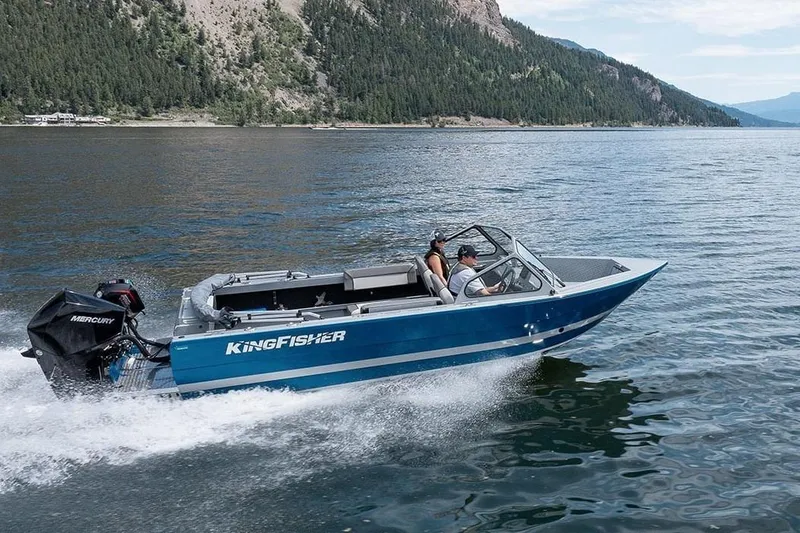 The Image of 2026 KingFisher 2025 Escape boat cruising on a scenic lake. - 1