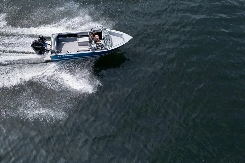 Slide: The Image of Aerial view of 2026 KingFisher 2025 Escape boat speeding on water. - 4