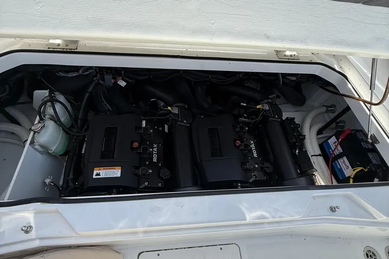 Slide: The Image of Engine compartment of 2021 Scarab 255 Open ID boat with Rotax engines. - 17