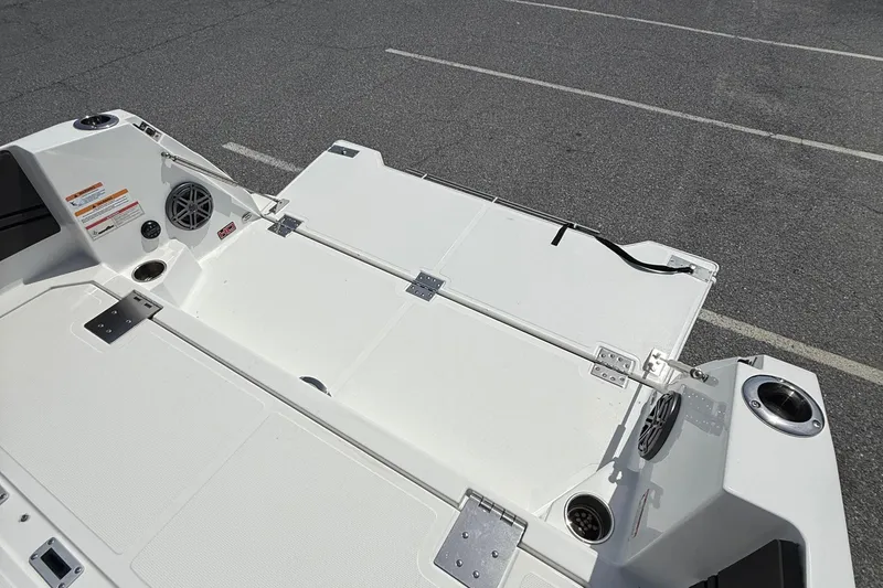 Slide: The Image of 2021 Scarab 255 Open ID boat deck with speakers and cup holders. - 19