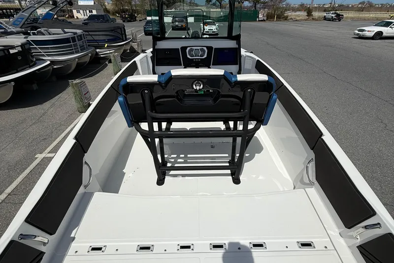 Slide: The Image of 2021 Scarab 255 Open ID boat interior with seating and control console. - 9