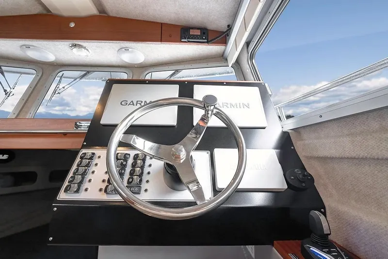 Slide: The Image of Helm of 2026 KingFisher 3225 GFX Offshore boat with Garmin navigation system. - 17