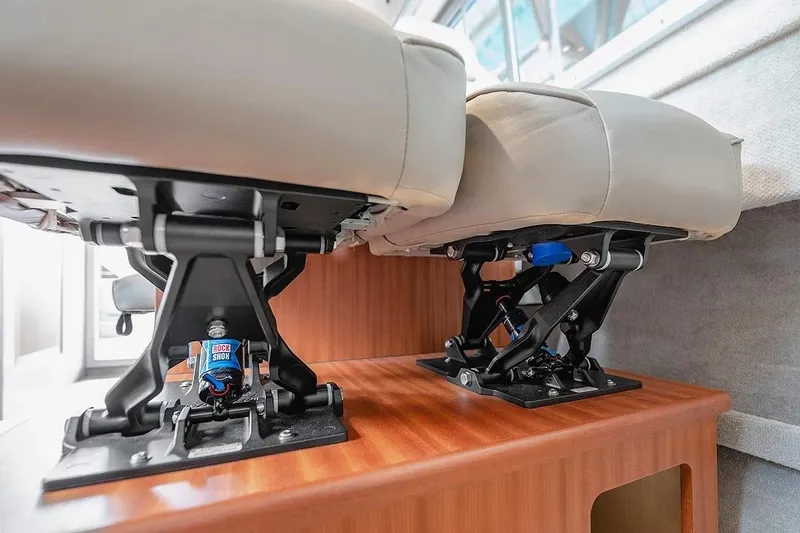 Slide: The Image of Interior seating of 2026 KingFisher 3225 GFX Offshore boat, showcasing sturdy seat mounts. - 21
