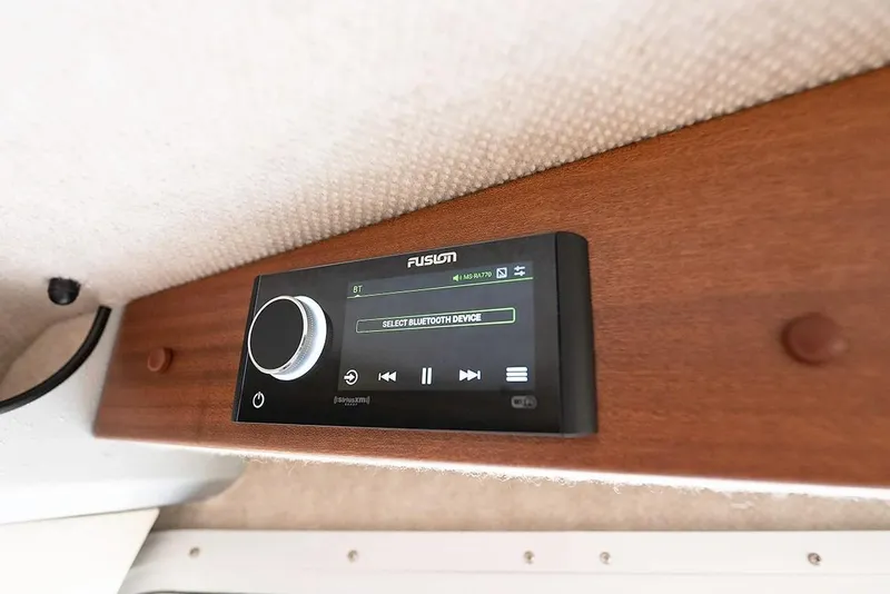 Slide: The Image of Fusion audio system in 2026 KingFisher 3225 GFX Offshore boat interior. - 28