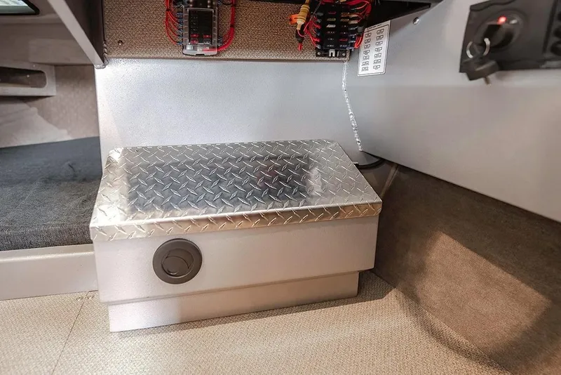 Slide: The Image of Interior of 2026 KingFisher 3225 GFX Offshore boat with metal storage compartment. - 31