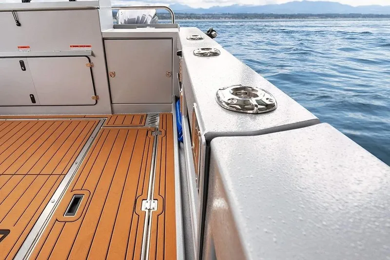 Slide: The Image of 2026 KingFisher 3225 GFX Offshore boat deck with sleek design and ocean view. - 36