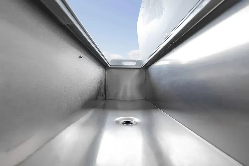 Slide: The Image of Interior view of KingFisher 3225 GFX Offshore boat, showcasing sleek metal finish, 2026 model. - 38