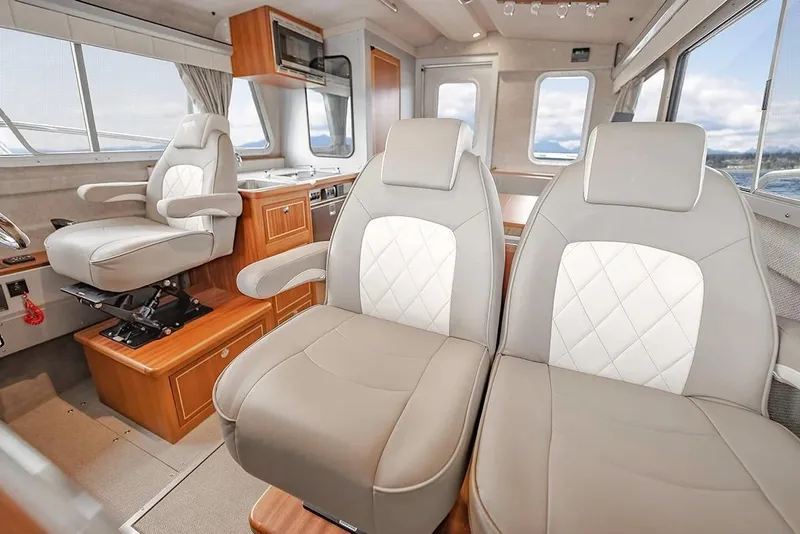 Slide: The Image of Luxurious interior of 2026 KingFisher 3225 GFX Offshore boat with plush seating. - 4