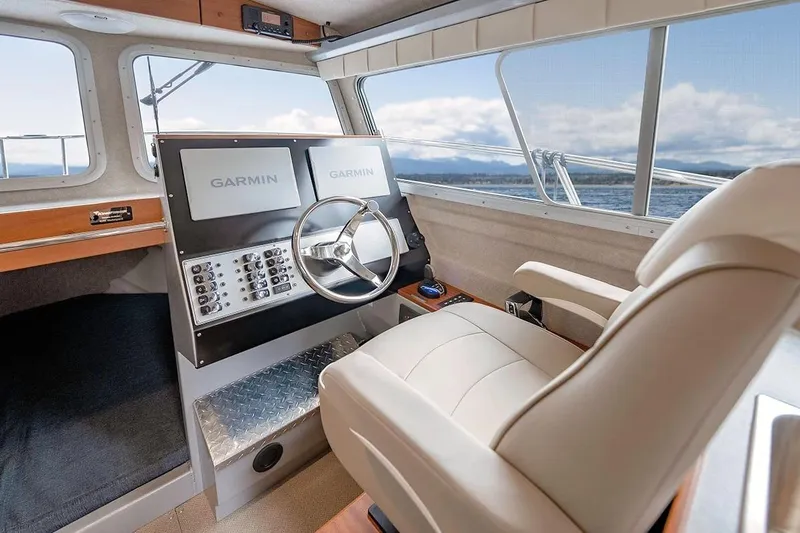 Slide: The Image of Interior of 2026 KingFisher 3225 GFX Offshore boat with Garmin navigation system. - 5