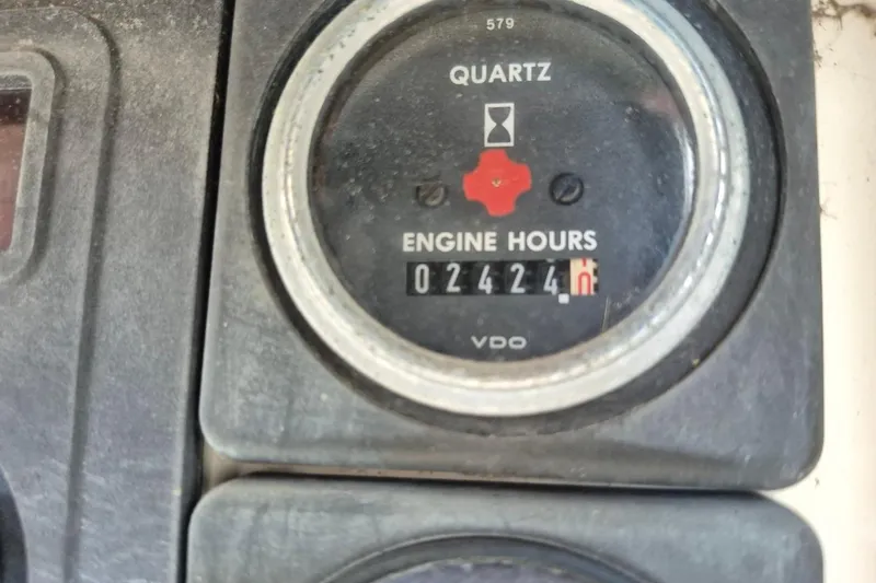 Slide: The Image of Close-up of a 1987 Morgan 384 engine hour meter displaying 2424 hours. - 29