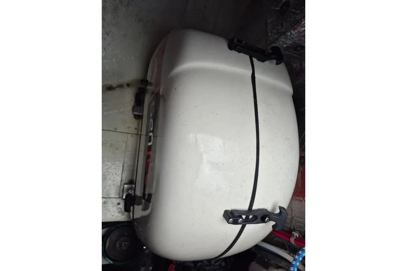 Slide: The Image of White storage compartment in a 1987 Morgan 384 boat interior. - 35