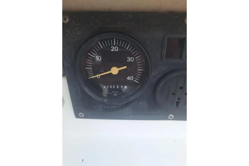 Slide: The Image of Close-up of a Yanmar tachometer on a 1987 Morgan 384 sailboat. - 41