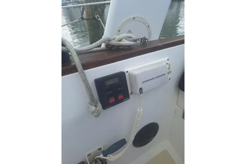 Slide: The Image of Control panel and radio on a 1987 Morgan 384 sailboat. - 43