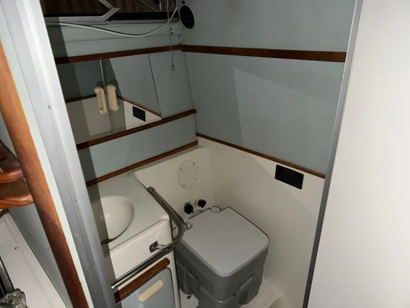 Slide: The Image of Bathroom in 1989 Sea Ray 300 Sundancer boat. - 10