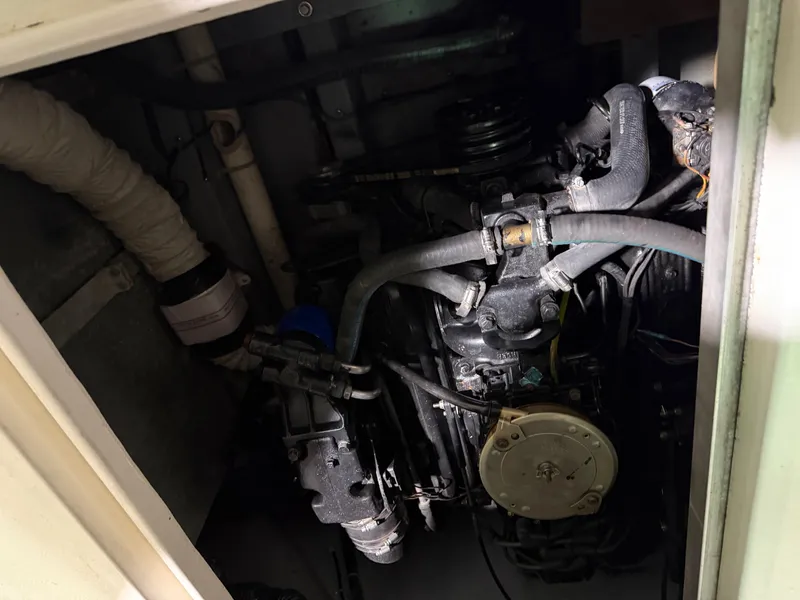 Slide: The Image of Engine compartment of a 1989 Sea Ray 300 Sundancer boat. - 19