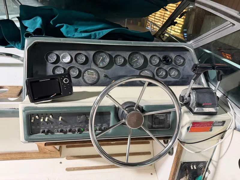Slide: The Image of Dashboard of a 1989 Sea Ray 300 Sundancer boat. - 20