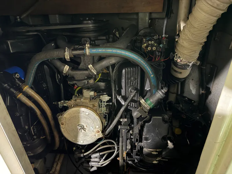 Slide: The Image of Engine compartment of a 1989 Sea Ray 300 Sundancer boat. - 24